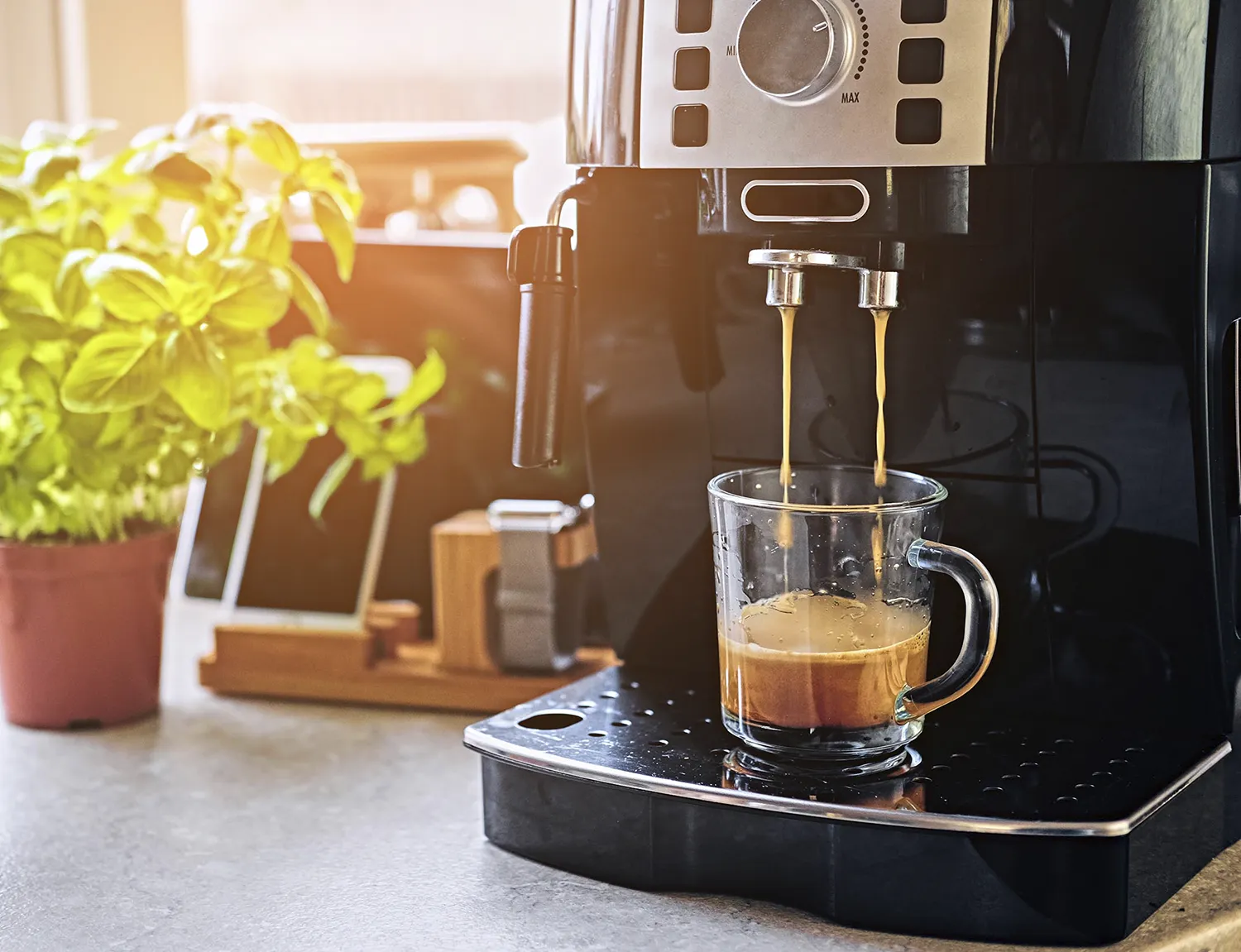 Image of the Magnifica S serving espresso