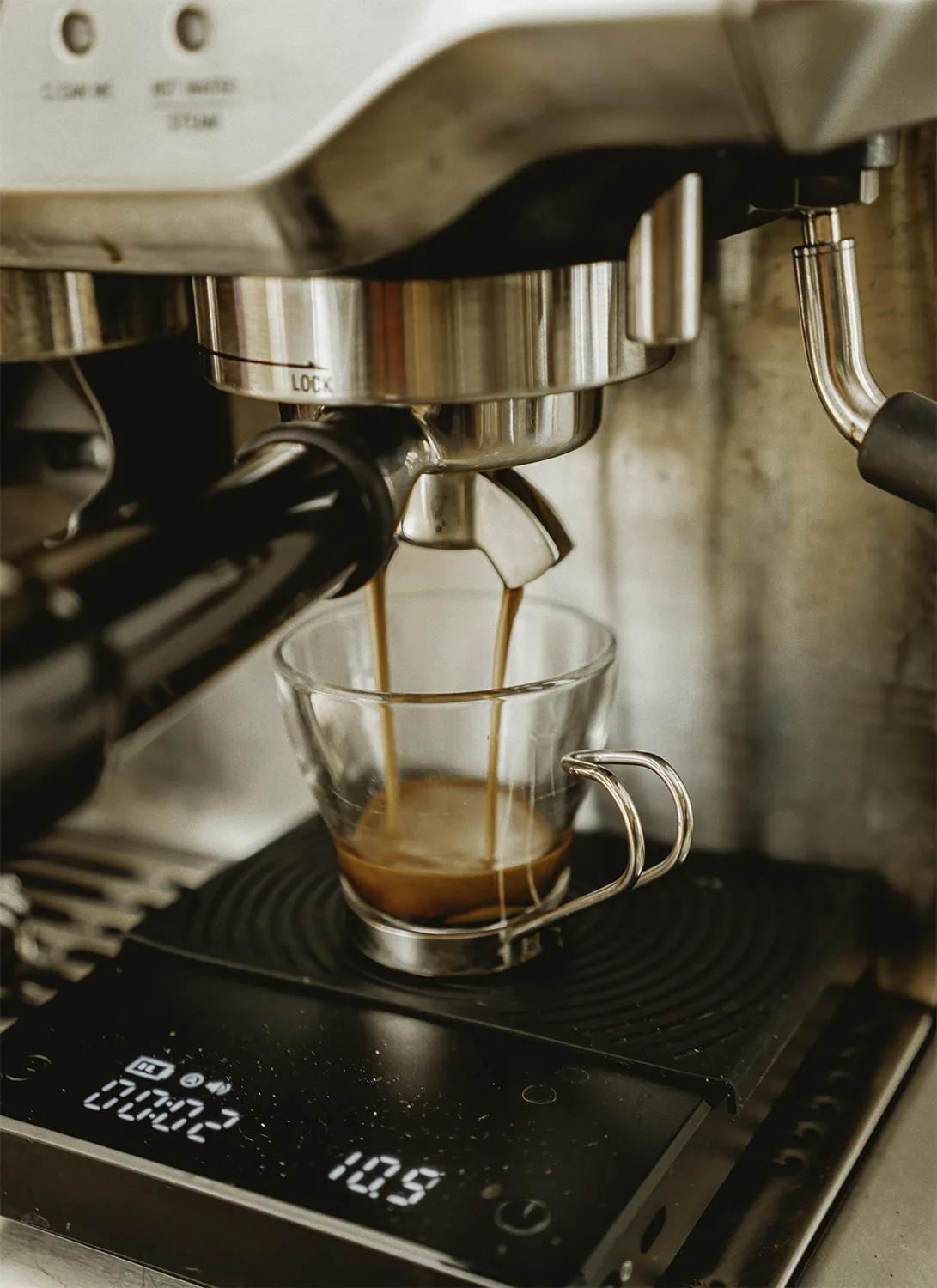 The Breville Barista Express extracting espresso